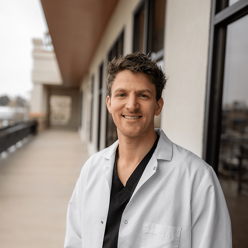 Dr. Griebel_White Coat_square Dr. Brian Minavi headshot
